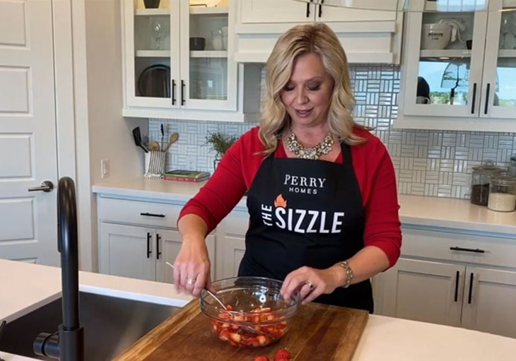 Stacy shows how to make strawberry lemonade shortcake in Perry Homes kitchen design 2504W.