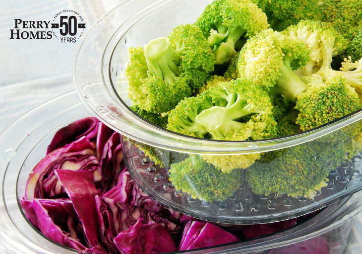 cut up broccoli and chopped red cabbage in two separate clear bowls