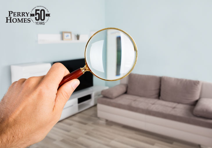 home inspection process - person with a magnifying glass