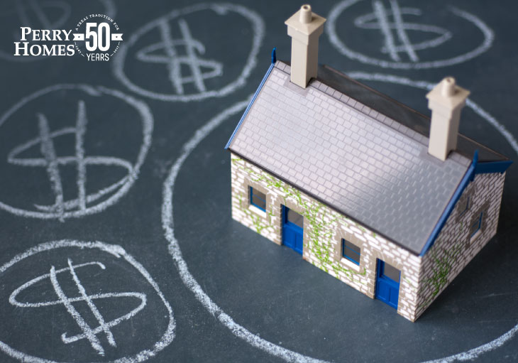 image of a toy house surrounded by dollar signs